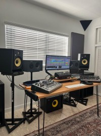 Christian “Tian” Jimenez uses KRK Rokit monitors and subwoofer while producing and mastering